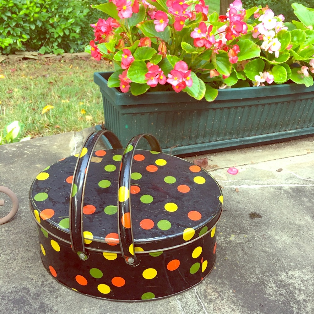 Polka dot tin vintage round can black red green